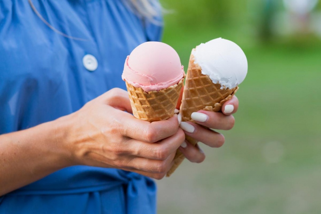 close-up-woman-holding-ice-cream-cones.jpg
